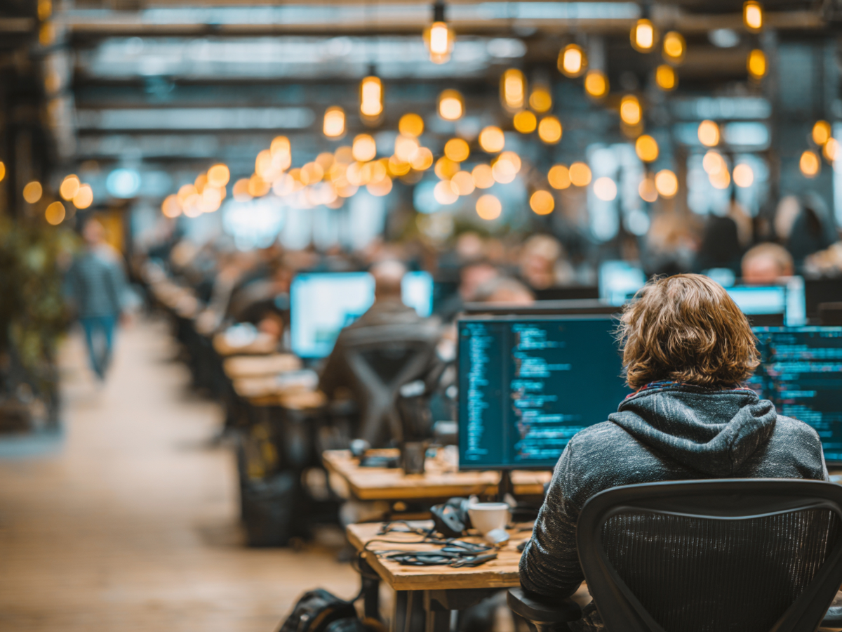AI drives tech efficiency and job cuts, but lasting value comes from combining automation with empowered human expertise.